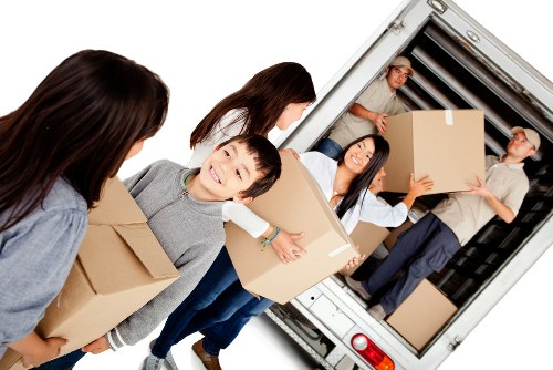 Moving house support in Slade Green with boxes and furniture