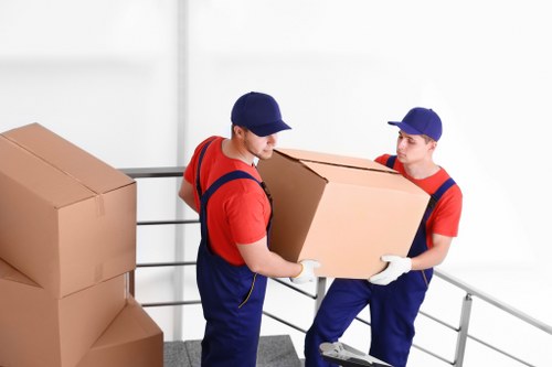 Packing materials and wrapped household items ready for transport
