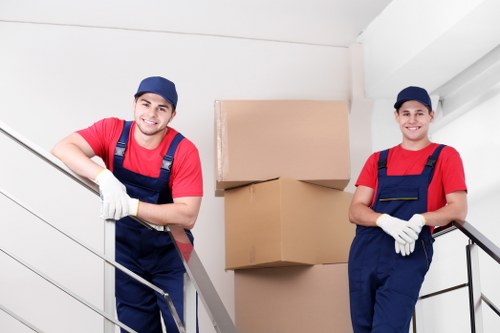 Labelled moving boxes prepared for unpacking in a local property