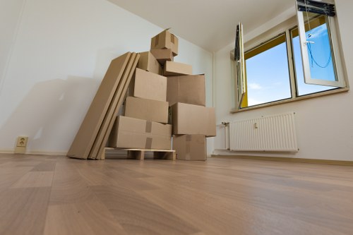 Loading household items into a moving truck in Slade Green