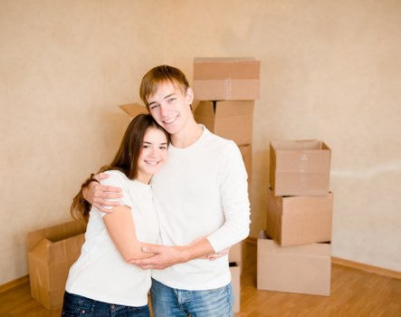 Commercial moving equipment and office boxes prepared for relocation