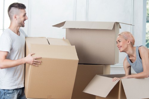 Careful handling of household items by a man with van service