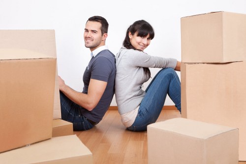 Loading furniture into a van during a Sladegreen move